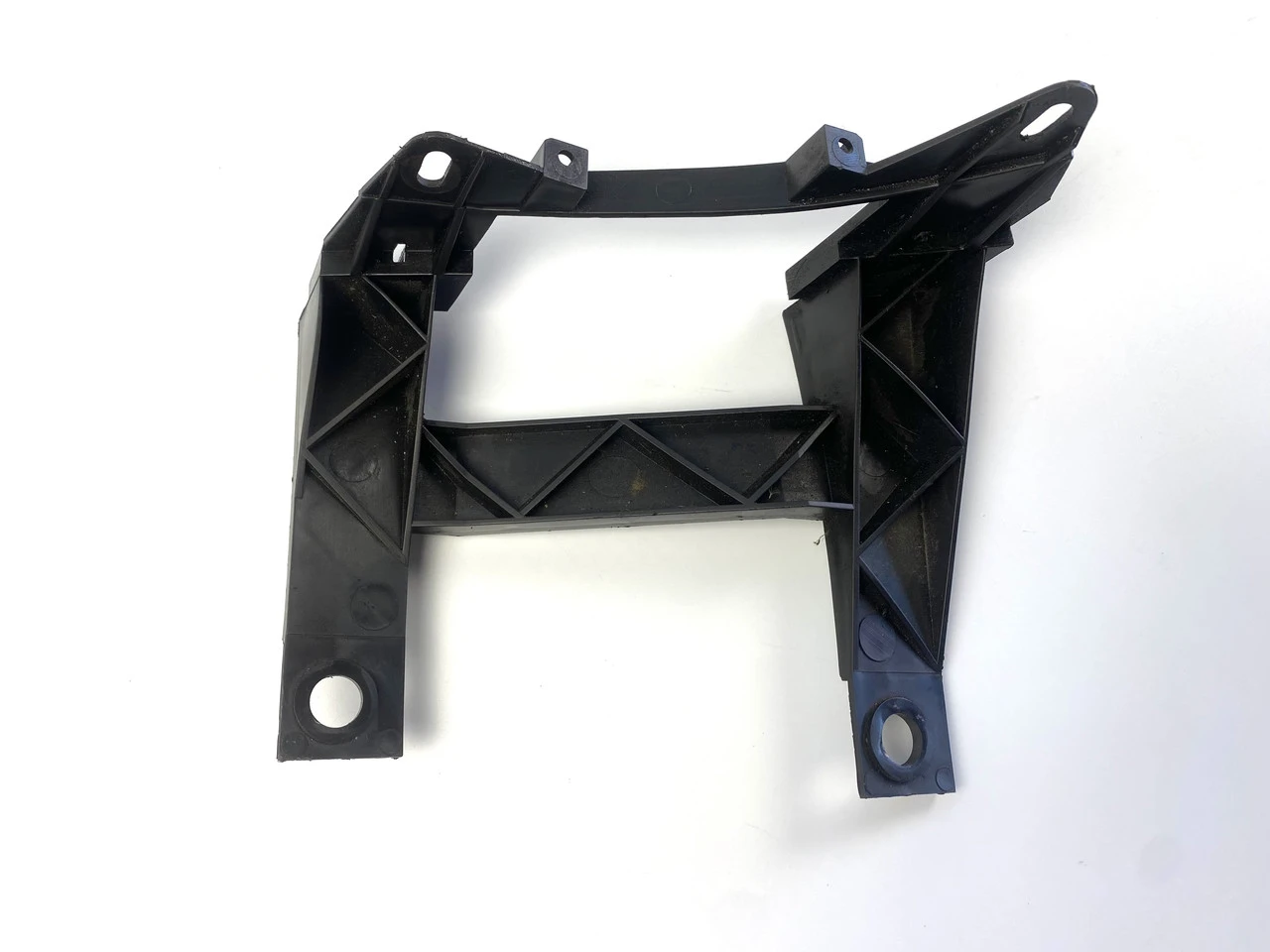 Кронштейн крепления передней правой фары VW T5 1301329422 - фото 1